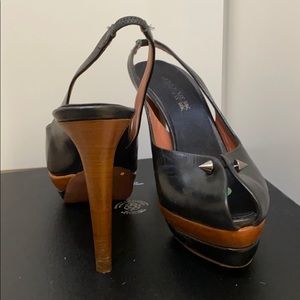 Guilaume black leather sling back pierced shoe